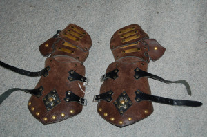 worn out leather gauntlets
